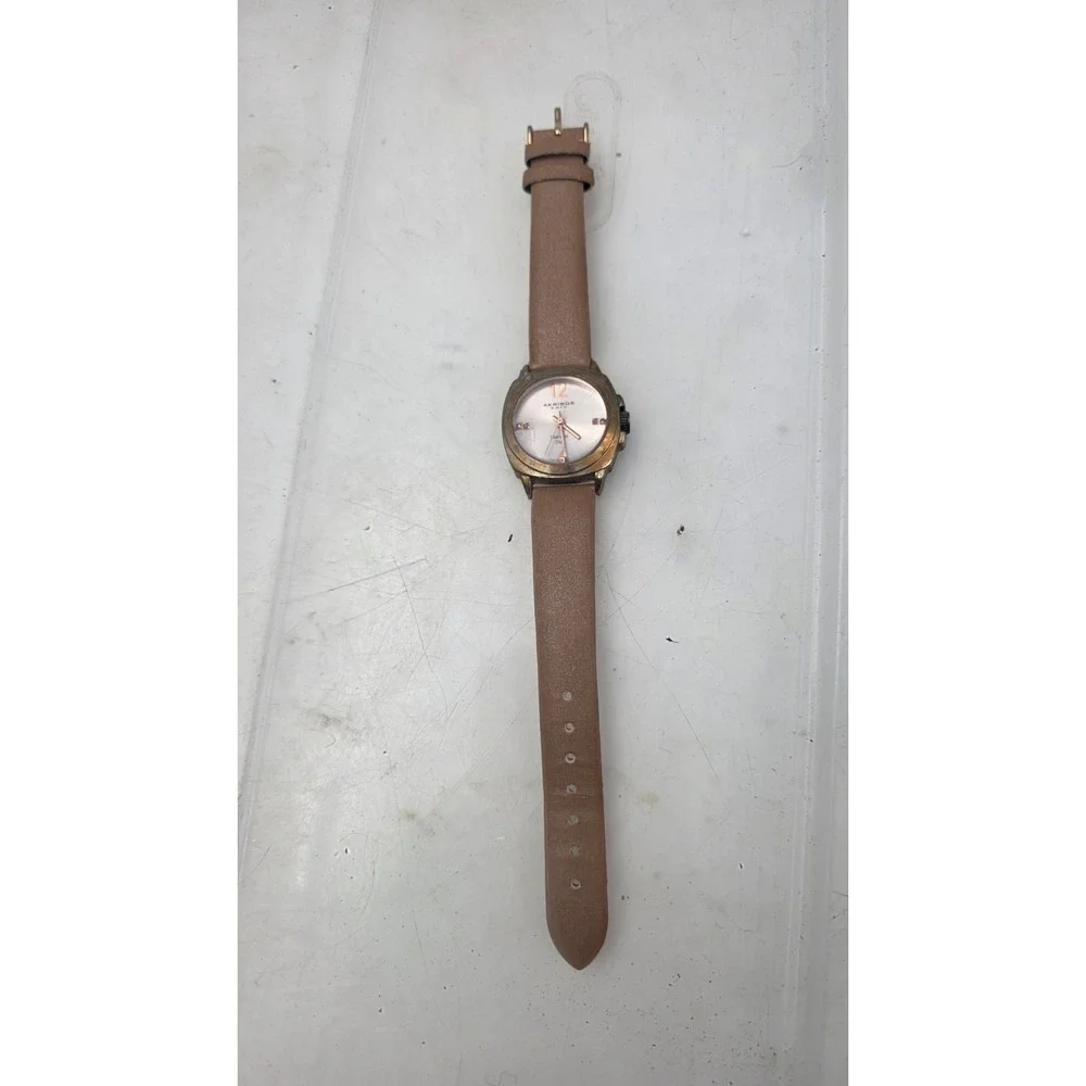 Akribos XXIV Women's AK742RG Lady Diamond Analog Display Swiss Quartz Champagne
